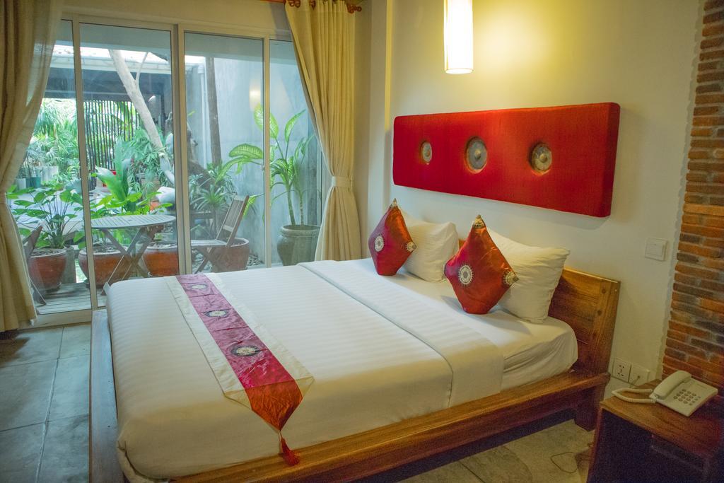 Casa Villa Independence Phnom Penh Quarto foto